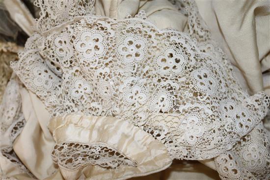 Two ornate babys 19th century christening capes, a silk and lace wedding train, waxed headdress and veil